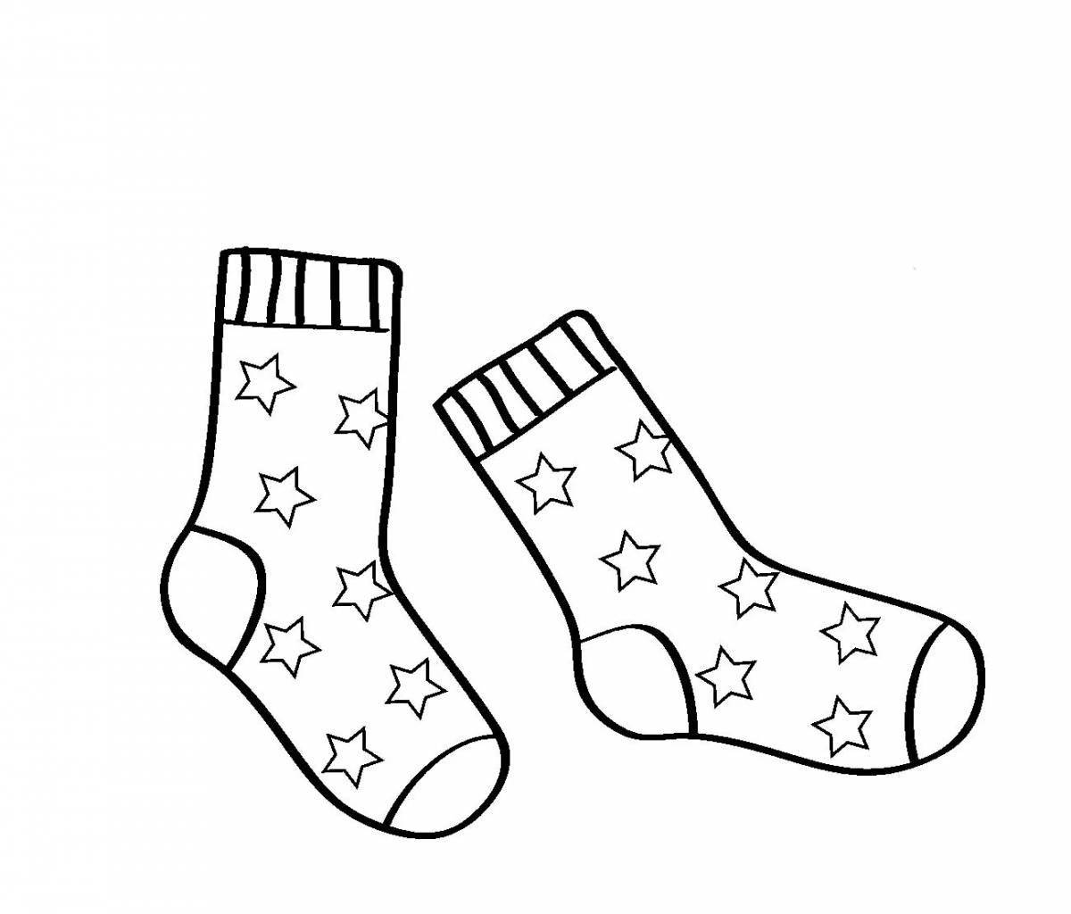 Раскраска Рождественские носки висят на стенке распечатать или скачать